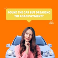 Woman concerned about a car payment with car behind her.